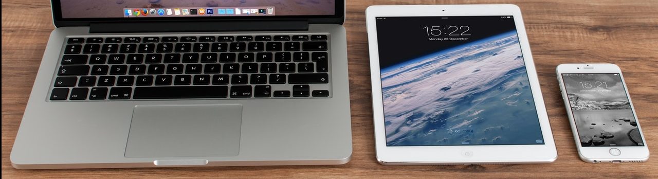 firing consultant companies blog image that contains a Macbook, iPad, iPhone