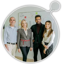 group of people in fron of white board moodle multitenancy